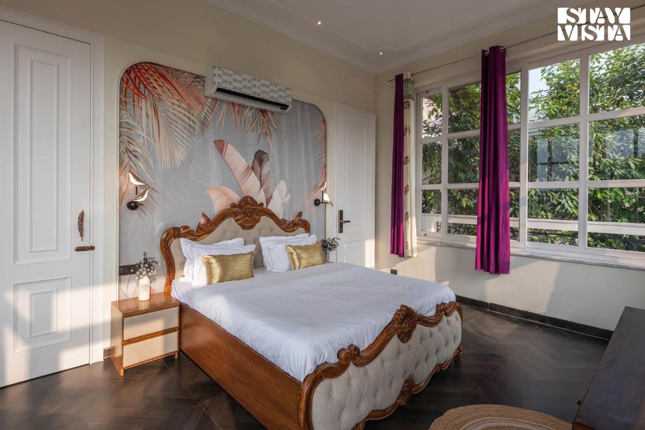 Stayvista's Indraj Manor - Roman-inspired With Posh Interiors, Mesmerizing Garden & Outdoor Fireplace Villa New Delhi